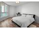 Cozy bedroom with a large window and natural light; complete with a desk for work at 231 Riverside Dr # 708, Daytona Beach, FL 32117