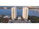 Stunning aerial view of waterfront condos and city skyline, showcasing prime real estate at 231 Riverside Dr # 708, Daytona Beach, FL 32117