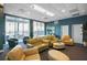 Inviting lounge area with soft seating and large windows, offering a perfect space to relax and socialize at 231 Riverside Dr # 708, Daytona Beach, FL 32117