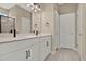 Bathroom featuring double sinks and an enclosed shower at 2311 Bear Peak Road, Minneola, FL 34715