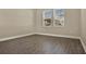 Empty bedroom with two windows at 2311 Bear Peak Road, Minneola, FL 34715