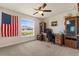 Bedroom with plenty of natural light and ceiling fan at 2412 Twin Lake View Rd, Winter Haven, FL 33881