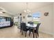Cozy dining area with backyard views and open access to the living room, perfect for entertaining at 2412 Twin Lake View Rd, Winter Haven, FL 33881