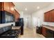 Functional kitchen offering efficient appliances, gas range, plenty of counter space, and easy access at 2412 Twin Lake View Rd, Winter Haven, FL 33881