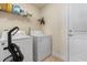 Laundry room featuring both a washer and dryer at 2412 Twin Lake View Rd, Winter Haven, FL 33881
