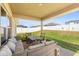 Covered patio with outdoor seating at 2412 Twin Lake View Rd, Winter Haven, FL 33881
