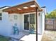 Covered back patio area perfect for enjoying the outdoors at 2480 Alamanda Ave, Deltona, FL 32738