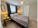 Cozy bedroom with ceiling fan and natural light, creating a relaxing atmosphere at 2480 Alamanda Ave, Deltona, FL 32738