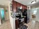 Well-maintained kitchen with stainless steel appliances, tile backsplash, and ample cabinet space at 2480 Alamanda Ave, Deltona, FL 32738