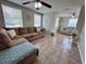 Open-concept living room offering great natural light and an inviting space to relax and entertain at 2480 Alamanda Ave, Deltona, FL 32738