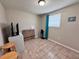 Versatile room featuring tile floors and a bright window, perfect for storage or hobbies at 2480 Alamanda Ave, Deltona, FL 32738