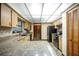 Bright kitchen features stone countertops, wood cabinets, and stainless steel appliances at 2713 Lime Tree Dr, Edgewater, FL 32141
