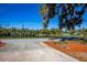 Waterfront view from home with a serene lake and surrounding trees creating a peaceful setting at 2713 Lime Tree Dr, Edgewater, FL 32141