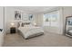 Bedroom features a cozy bed, modern window, and stylish decor for relaxation at 2839 Common Crane Ct, Harmony, FL 34773