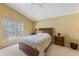 Comfortable bedroom with soft lighting, neutral decor, and inviting ambiance for restful nights at 2839 Drifting Lilly Loop, Kissimmee, FL 34747