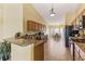 Well-equipped kitchen with modern appliances, granite countertops, and convenient breakfast bar at 2839 Drifting Lilly Loop, Kissimmee, FL 34747