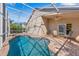 Inviting screened-in pool area with comfortable seating, perfect for relaxing or entertaining at 2839 Drifting Lilly Loop, Kissimmee, FL 34747