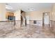 Open-concept living area featuring neutral paint, stairs, and tiled flooring at 2850 Retreat View Cir, Sanford, FL 32771