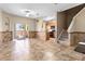 Open-concept living and dining area featuring neutral paint and tiled flooring at 2850 Retreat View Cir, Sanford, FL 32771