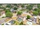 Aerial view of the property, featuring a screened pool and fenced backyard at 2910 S Whisperbay Ct, Oviedo, FL 32765