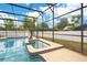 In-ground pool and spa with palm trees and a white fence, providing a resort-like experience at 2910 S Whisperbay Ct, Oviedo, FL 32765