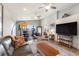 Inviting living room with comfortable seating, and water views from the large windows, creating a relaxing atmosphere at 29150 Beauclaire Dr, Tavares, FL 32778