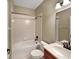 Cozy bathroom featuring a shower-tub combo and vanity with mirror at 30411 Gidran Ter, Mount Dora, FL 32757