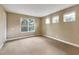 Bright bedroom with large windows offering natural light and views of the outdoors at 30411 Gidran Ter, Mount Dora, FL 32757
