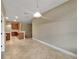 Dining room featuring tiled floors and modern lighting at 30411 Gidran Ter, Mount Dora, FL 32757