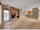Spacious living room with a fireplace and an open floor plan at 30411 Gidran Ter, Mount Dora, FL 32757