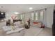 Bright living room with a view of dining area and kitchen at 31 Abacus Ave, Ormond Beach, FL 32174