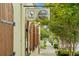 Charming storefront with rustic wooden doors, signage, and street view, showcasing unique architectural details at 33432 Seattle Slew Dr, Sorrento, FL 32776