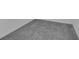 Close-up of plush, gray carpet at 33448 Seattle Slew Dr, Sorrento, FL 32776