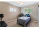 Neutral bedroom with neutral carpet, a twin bed, and natural light at 4366 Roanne Dr, Orlando, FL 32817