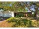 Charming single-story home with mature landscaping and a two-car garage at 4366 Roanne Dr, Orlando, FL 32817