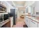 Updated kitchen features stainless steel appliances and lots of cabinet space at 4366 Roanne Dr, Orlando, FL 32817