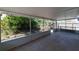 Screened lanai offering a view of the greenery and privacy of the backyard at 458 Cadenza Dr, Orlando, FL 32807
