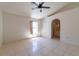 Large main bedroom offering tile flooring, shutters and entry to ensuite bath at 458 Cadenza Dr, Orlando, FL 32807
