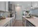 Beautiful kitchen with stainless steel appliances, a tile backsplash, and stone countertops at 4630 Cragmere Loop, Clermont, FL 34711
