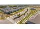 Aerial view of the Silverleaf community entrance featuring landscaped medians and modern homes at 4994 Citrus Leaf Blvd, Winter Garden, FL 34787