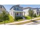 Charming home with a covered front porch, neat landscaping, and inviting curb appeal at 4994 Citrus Leaf Blvd, Winter Garden, FL 34787