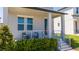 Inviting front porch featuring comfortable seating and a welcoming ambiance at 4994 Citrus Leaf Blvd, Winter Garden, FL 34787