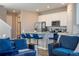 Modern kitchen with stainless appliances, ample counter space, and stylish bar seating at 4994 Citrus Leaf Blvd, Winter Garden, FL 34787
