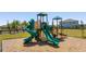 Close-up of a community playground with slides, and climbing structures at 4994 Citrus Leaf Blvd, Winter Garden, FL 34787
