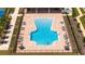 A resort-style pool, surrounded by lounge chairs and manicured landscaping, offers a relaxing oasis at 4994 Citrus Leaf Blvd, Winter Garden, FL 34787