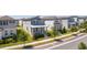 Street view showcasing the home's location among similar, well-maintained properties at 4994 Citrus Leaf Blvd, Winter Garden, FL 34787