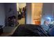 This bedroom has a closet and the door to the bathroom are visible at 5471 Vineland Rd # 7108, Orlando, FL 32811