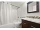 Cozy bathroom with shower/tub and single sink vanity at 6114 Peregrine Ave # D03, Orlando, FL 32819