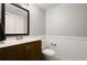 A clean, modern bathroom features a new vanity, wainscotting, and updated fixtures at 6114 Peregrine Ave # D03, Orlando, FL 32819