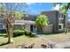Charming townhome with mature landscaping and a well-maintained exterior at 6114 Peregrine Ave # D03, Orlando, FL 32819